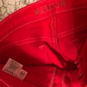 J Brand red/orange skinny jeans with zippers